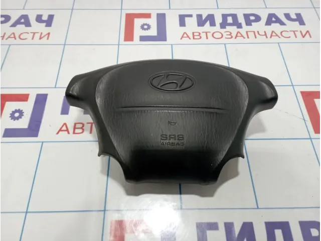 Подушка безопасности в рулевое колесо Hyundai Starex (A1) 569004A100LK