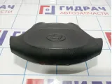 Подушка безопасности в рулевое колесо Hyundai Starex (A1) 569004A100LK