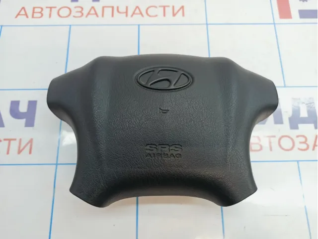 Подушка безопасности в рулевое колесо Hyundai Tucson (JM) 569002E200WK