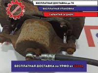 Суппорт тормозной передний левый Hyundai Tucson (JM) 581802EA10.