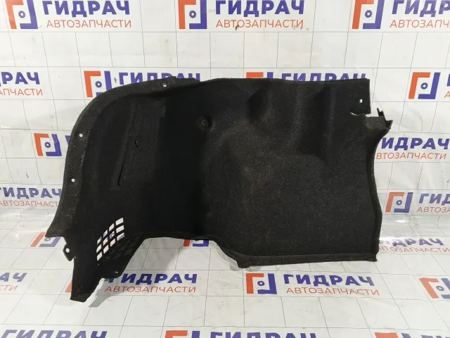 Обшивка багажника левая Hyundai Verna 857301E100CH