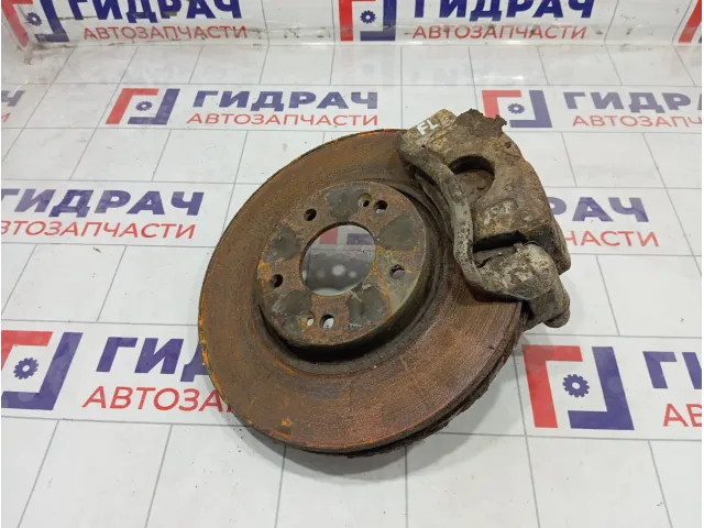 Суппорт тормозной передний левый Hyundai i40 581103Z100