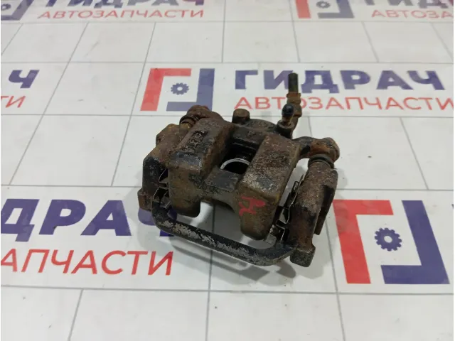 Суппорт тормозной задний левый Infiniti FX35 44011CG012