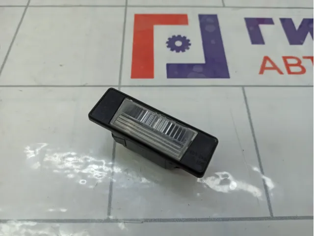 Фонарь подсветки номера Infiniti Q50 265108990A