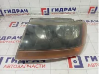 Фара левая Jeep Grand Cherokee 55155145AD
