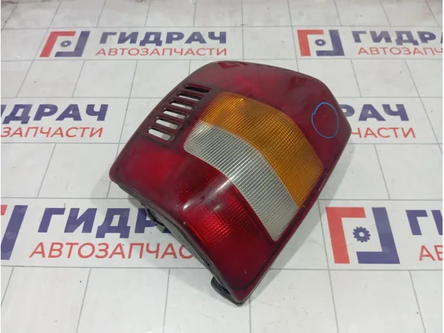 Фонарь задний левый Jeep Grand Cherokee 55155143AC