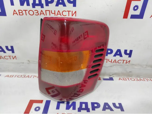 Фонарь задний правый Jeep Grand Cherokee (WJ) 55155142AC. Царапины.
