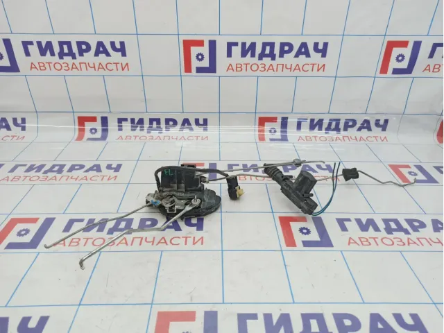 Замок двери передней левой Kia Spectra 0K2N1-59310.