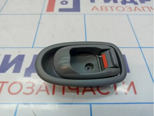 Ручка двери внутренняя левая Kia Spectra 0K2N15933096.