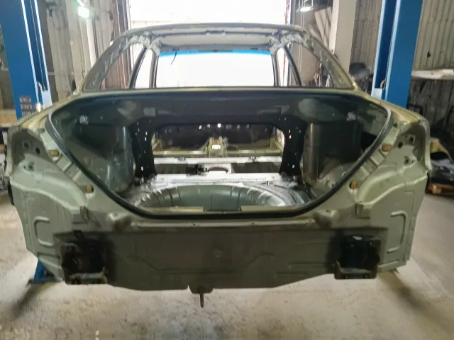 Панель задняя Kia Spectra 0K2NB70750.