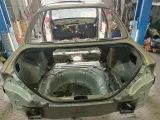 Панель задняя Kia Spectra 0K2NB70750.