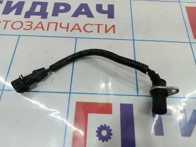 Датчик положения распредвала Kia Spectra 0K30E18131B.