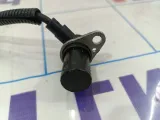 Датчик положения распредвала Kia Spectra 0K30E18131B.