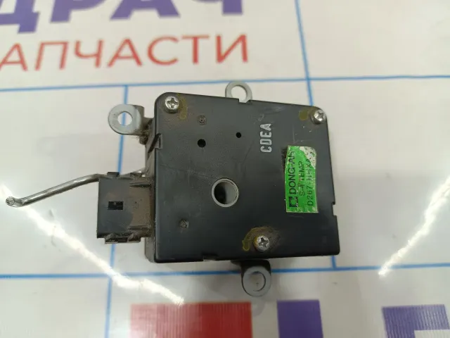 Моторчик заслонки отопителя Kia Spectra 0K2N161A25.