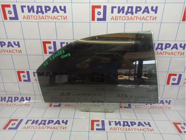 Стекло двери задней правой Kia Spectra .