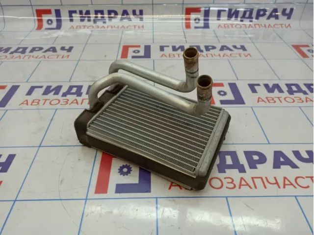 Радиатор отопителя Kia Spectra 0K2A1-61A10.