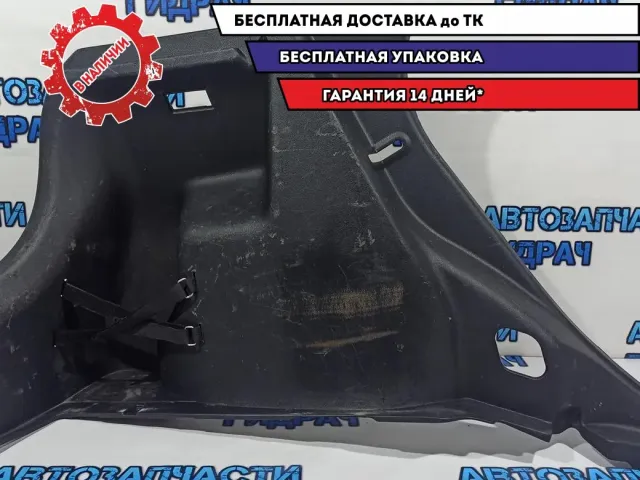 Обшивка багажника левая Kia Rio 3 857304Y500WK. Царапины.