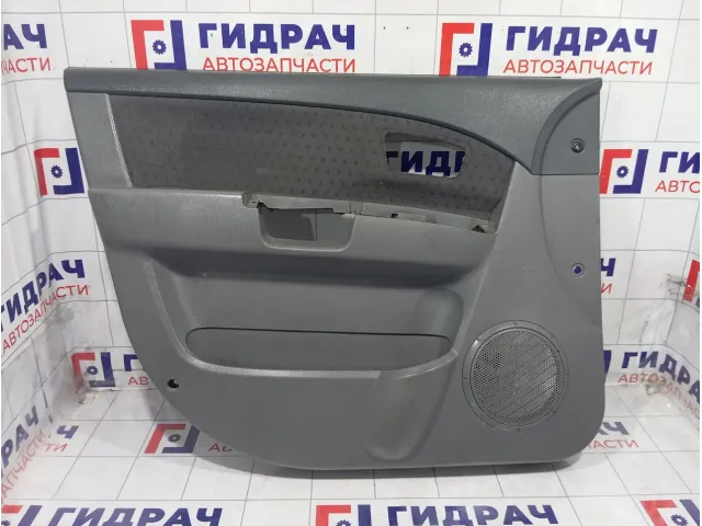 Обшивка двери передней левой Kia Carens 0K2JD68450Z6