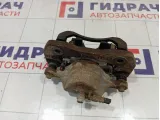 Суппорт тормозной передний левый Kia Carens 0K2JA33990A