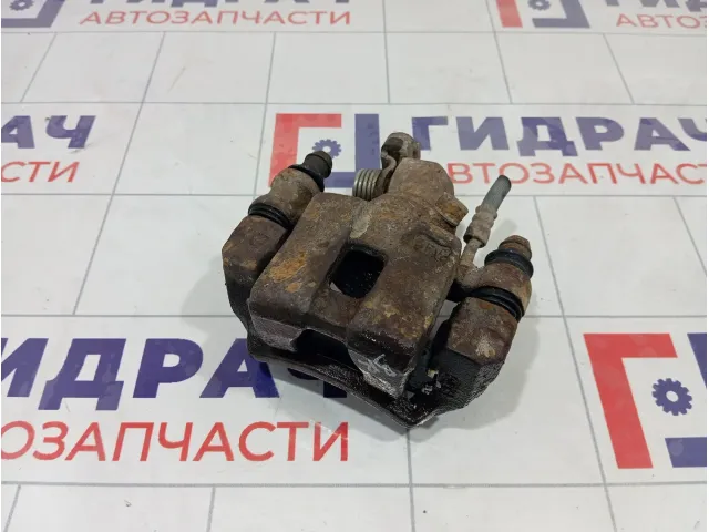 Суппорт тормозной задний правый Kia Carens 0K2FC26980
