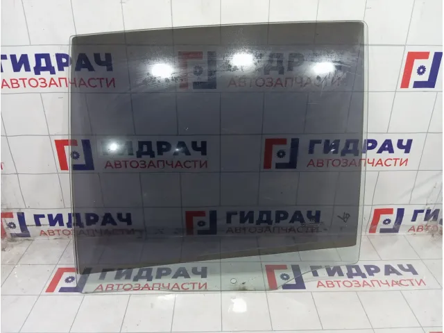 Стекло двери задней левой Kia Carens 834211D000