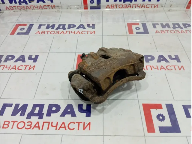 Суппорт тормозной передний левый Kia Carens 581101D100