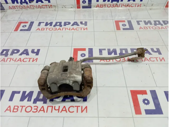 Суппорт тормозной задний правый Kia Carens 582301D100