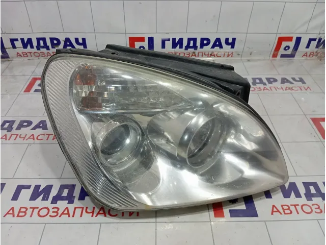 Фара правая Kia Carens 921021D020