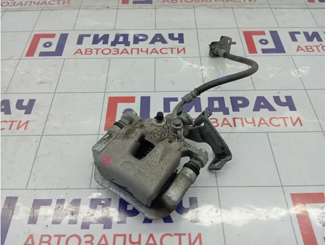 Суппорт тормозной задний левый Kia Cerato 58210M6300