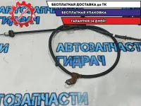 Трос стояночного тормоза левый Kia Rio 3 59760-1R300.