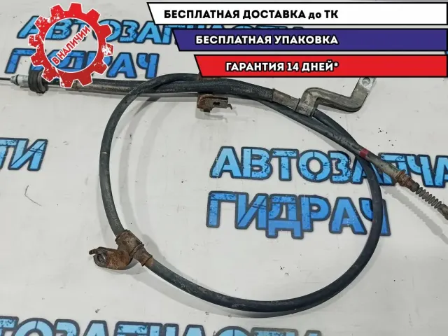 Трос стояночного тормоза правый Kia Rio 3 59770-1R300.