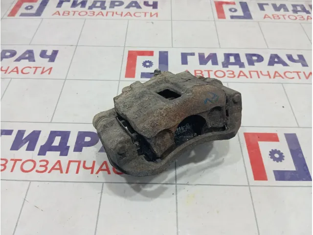 Суппорт тормозной передний левый Kia Rio 2 581101G100