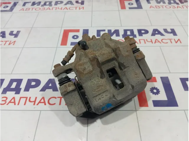 Суппорт тормозной передний правый Kia Rio 581301G100