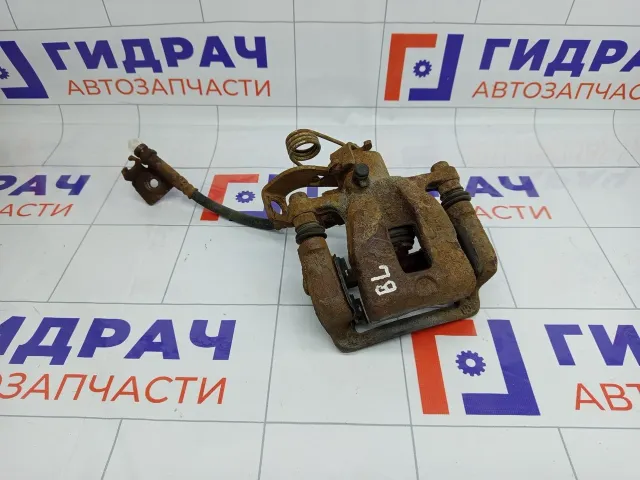 Суппорт тормозной задний левый Kia Rio 583001R300