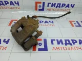 Суппорт тормозной передний правый Kia Rio 581304L000