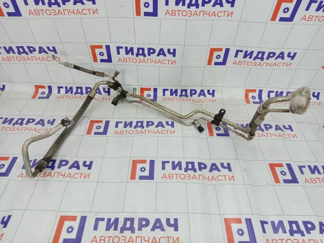 Трубка кондиционера Kia Rio 977754L000