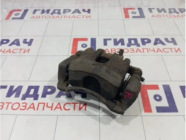 Суппорт тормозной передний левый Kia Rio 581104L000