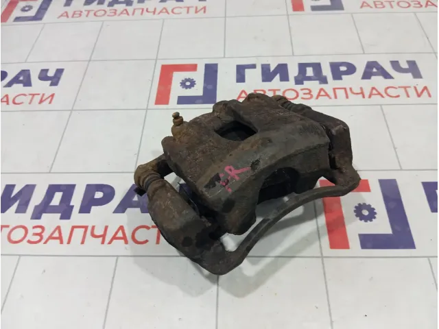 Суппорт тормозной передний правый Kia Rio 581304L000