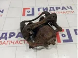 Суппорт тормозной передний правый Kia Rio 581304L000