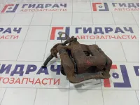 Суппорт тормозной задний левый Kia Rio 583001R300