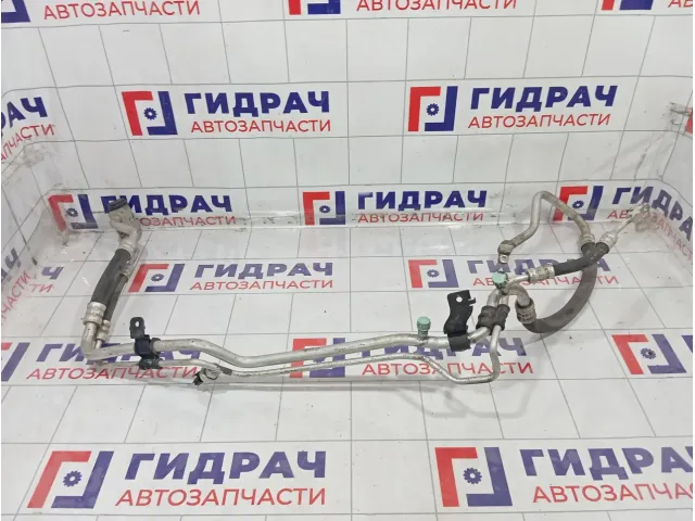 Трубка кондиционера Kia Rio 977754L000