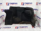 Обшивка багажника правая Kia Rio 857404Y000WK