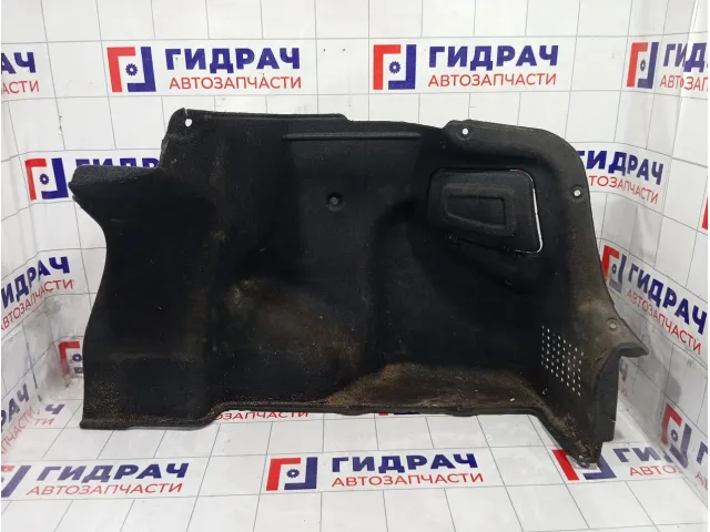 Обшивка багажника правая Kia Rio 857404Y000WK