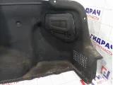 Обшивка багажника правая Kia Rio 857404Y000WK