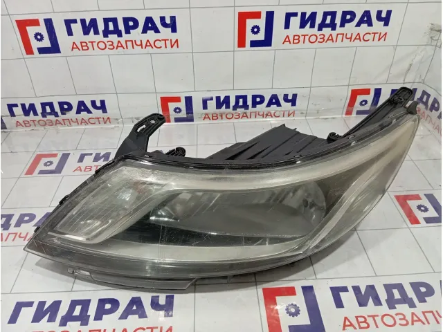 Фара левая Kia Rio 921014X000