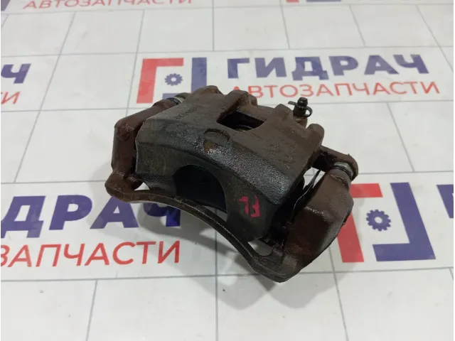 Суппорт тормозной передний левый Kia Rio 581104L000