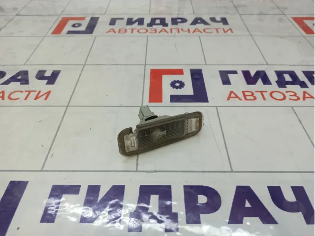 Фонарь подсветки номера левый Kia Rio 925011G000