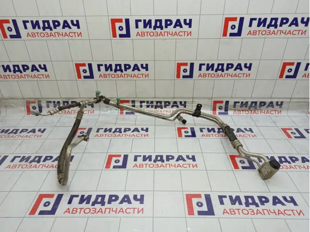 Трубка кондиционера Kia Rio 977754L000