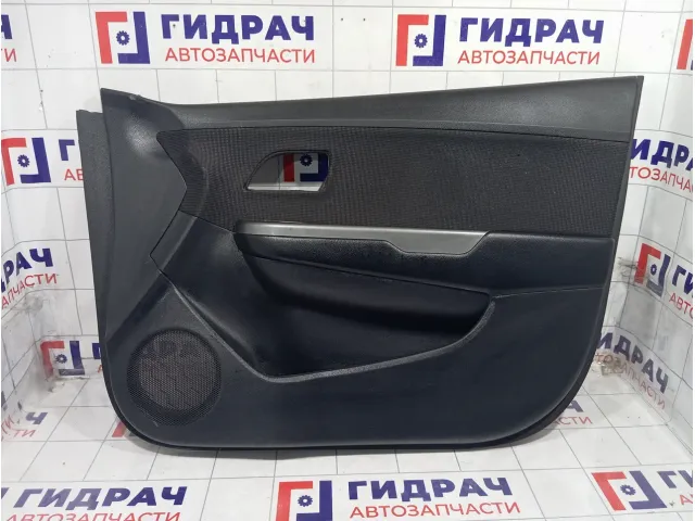 Обшивка двери передней правой Kia Rio 823024Y030WK