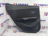 Обшивка двери задней левой Kia Rio 833014Y030WK